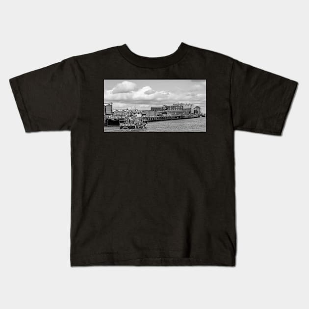 RNLI lifeboat motoring up the River Yare in the town of Great Yarmouht, Norfolk Kids T-Shirt by yackers1